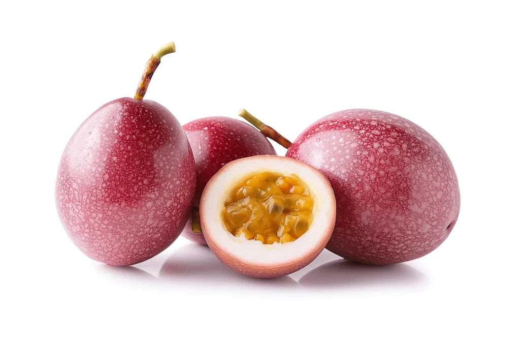 Halved passionfruit on a ceramic plate with a spoonful of pulp beside it, illustrating a calming and nutrient-rich bedtime snack