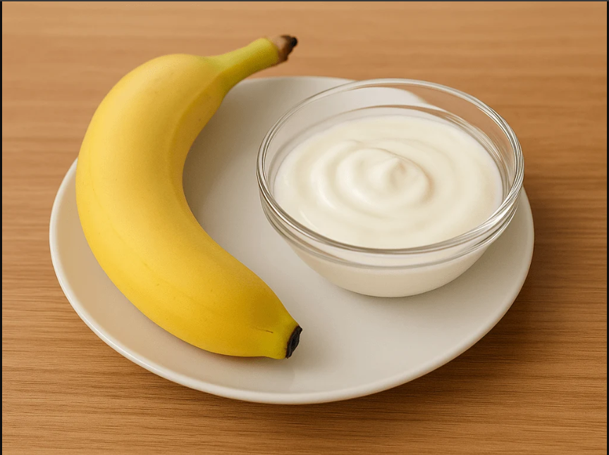 Healthy bedtime snack of banana and yogurt to prevent teens from going to bed hungry or too full.